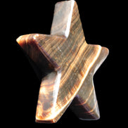 Chocolate Calcite Star 105*20mm 266.5g in bright sunlight - Rocks and Things Store