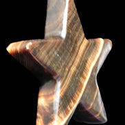 Chocolate Calcite Star 105*20mm 266.5g in bright sunlight - Rocks and Things Store