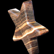 Chocolate Calcite Star 105*20mm 266.5g in bright sunlight - Rocks and Things Store