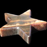 Chocolate Calcite Star 105*20mm 266.5g in bright sunlight - Rocks and Things Store