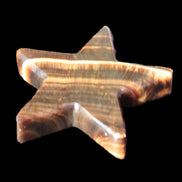 Chocolate Calcite Star 105*20mm 266.5g in bright sunlight - Rocks and Things Store