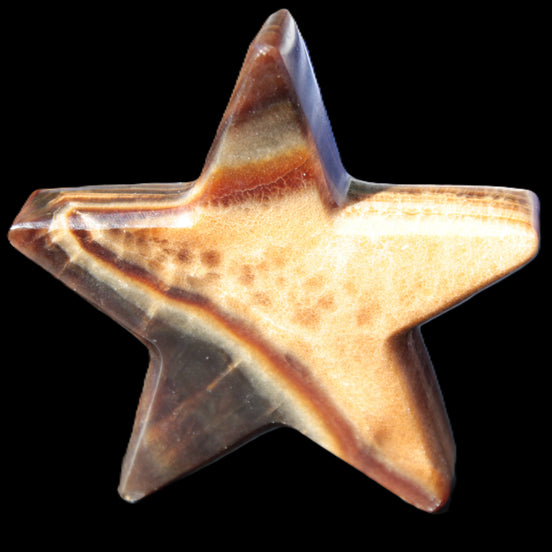Chocolate Calcite Star 103*17mm 232.4g in sunlight - Rocks and Things Store
