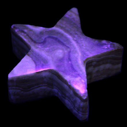 Chocolate Calcite Star 64*21mm 112.2g in UV light - Rocks and Things Store