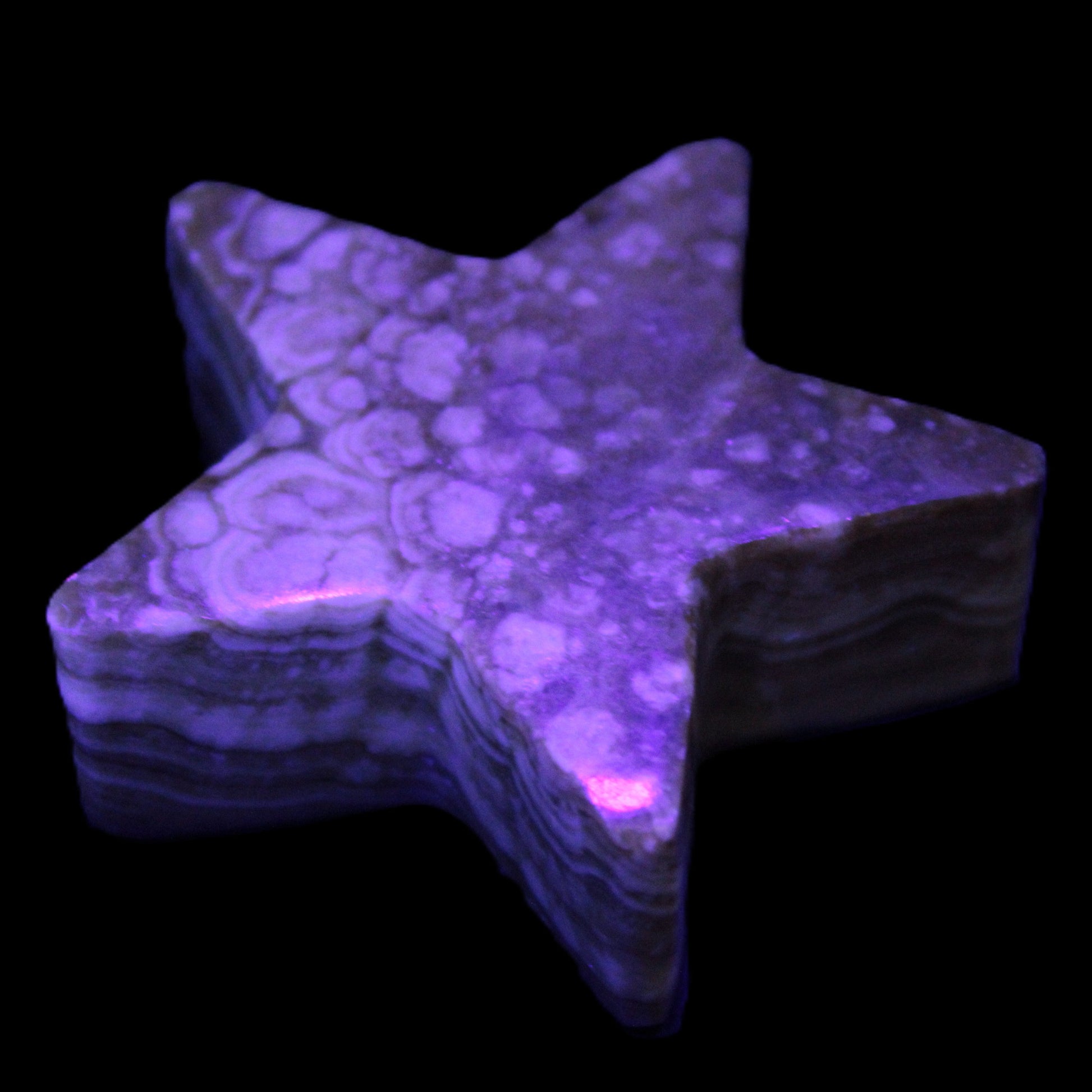 Chocolate Calcite Star 64*21mm 112.2g in UV light - Rocks and Things Store