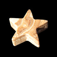 Chocolate Calcite Star 64*21mm 112.2g in bright sunshine - Rocks and Things Store