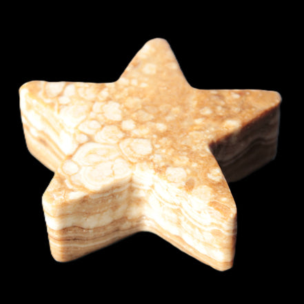 Chocolate Calcite Star 64*21mm 112.2g in bright sunshine - Rocks and Things Store
