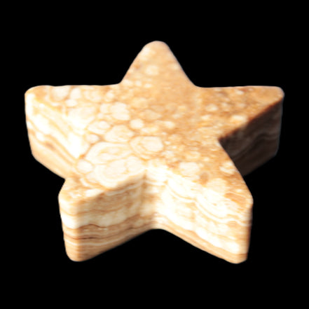Chocolate Calcite Star 64*21mm 112.2g in bright sunshine - Rocks and Things Store