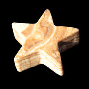 Chocolate Calcite Star 64*21mm 112.2g in bright sunshine - Rocks and Things Store