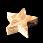 Chocolate Calcite Star 64*21mm 112.2g in bright sunshine - Rocks and Things Store