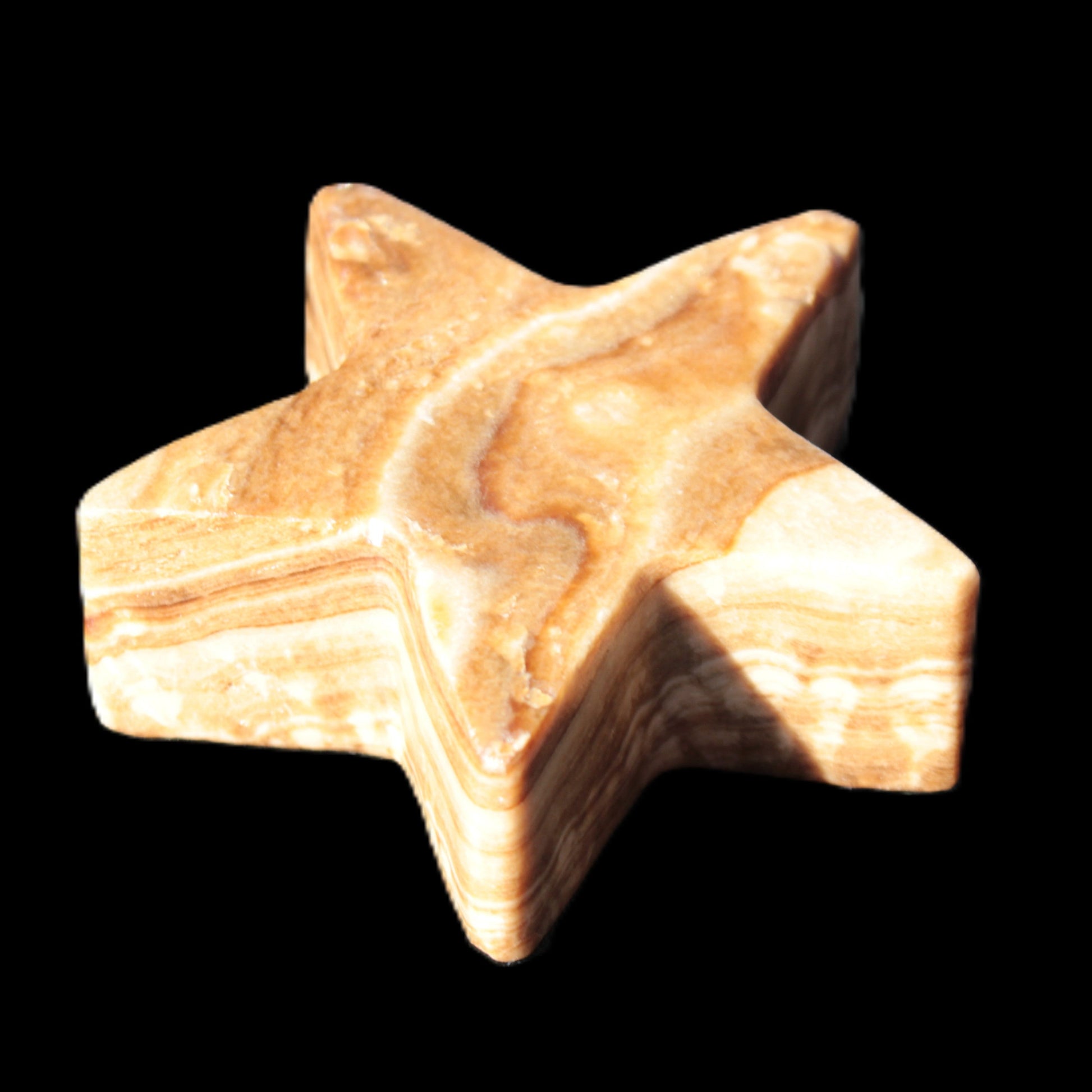 Chocolate Calcite Star 64*21mm 112.2g in bright sunshine - Rocks and Things Store