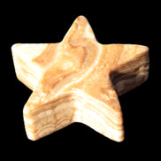 Chocolate Calcite Star 64*21mm 112.2g in bright sunshine - Rocks and Things Store