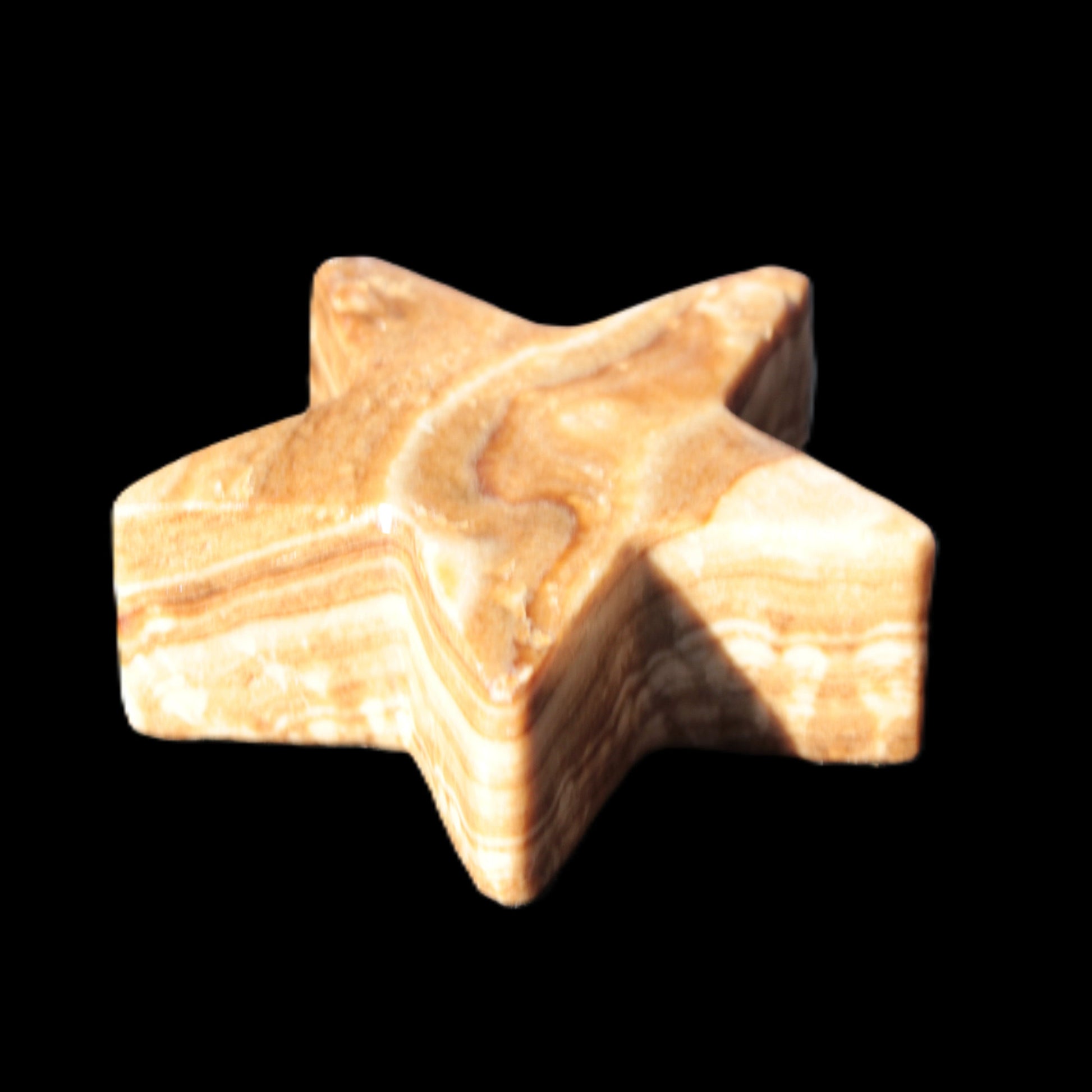 Chocolate Calcite Star 64*21mm 112.2g in bright sunshine - Rocks and Things Store