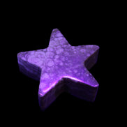 Chocolate Calcite Star 64*21mm 112.2g in UV light - Rocks and Things Store