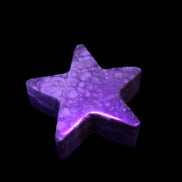 Chocolate Calcite Star 64*21mm 112.2g in UV light - Rocks and Things Store