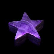 Chocolate Calcite Star 64*21mm 112.2g in UV light - Rocks and Things Store