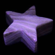 Chocolate Calcite Star 66*22mm 120g in UV light - Rocks and Things Store