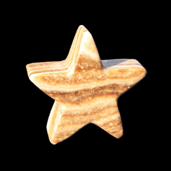 Chocolate Calcite Star 66*22mm 120g in sunlight - Rocks and Things Store