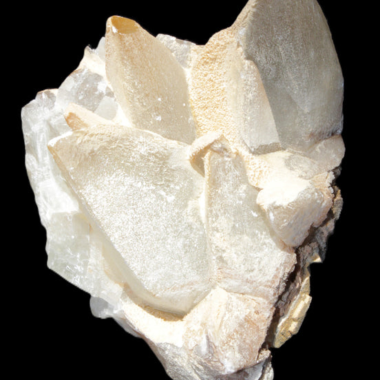 Dogtooth calcite cluster 100*82*78mm 508g in sunlight - Rocks and Things Store