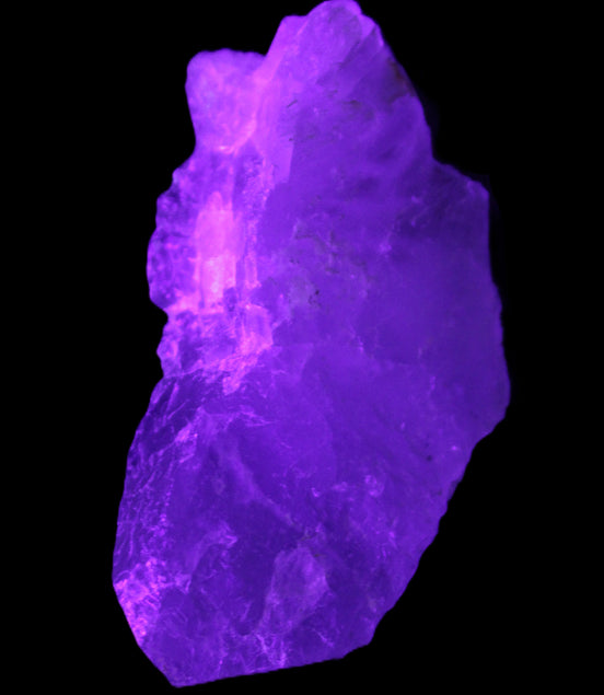 Clear with Purple Fluorite cluster 92*45*42mm 216.8g in UV light