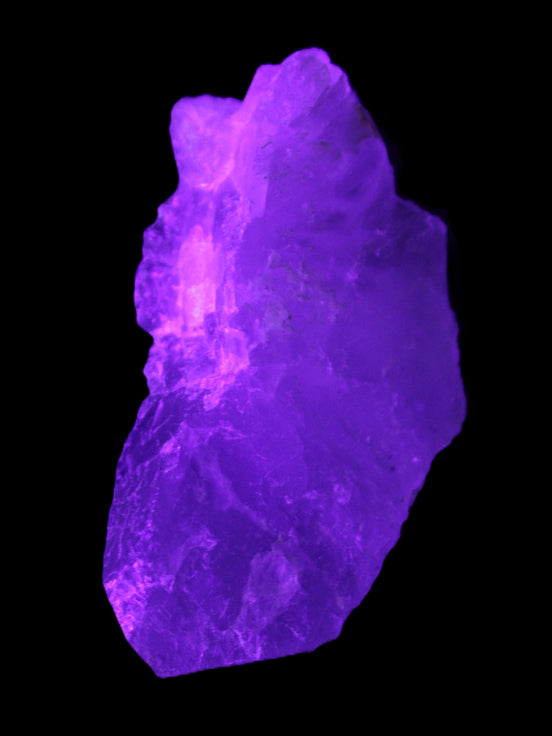 Clear with Purple Fluorite cluster 92*45*42mm 216.8g in UV light