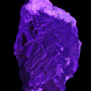 Clear Fluorite cluster 145*100*34mm 648g in UV light