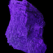 Clear Fluorite cluster 159*113*57mm 920.5g in UV light - Rocks and Things Store