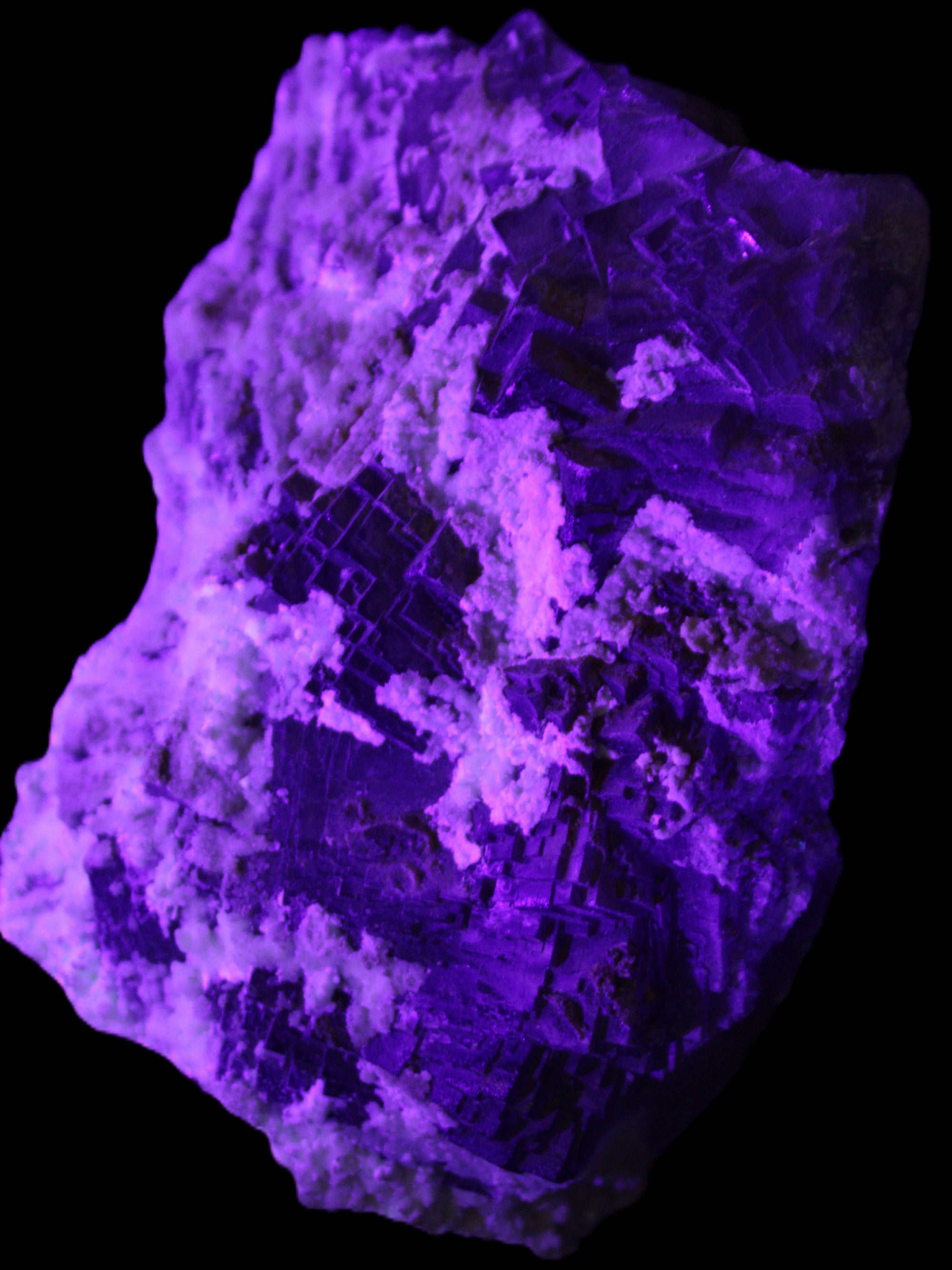 Complex stepped Fluorite cluster 173*141*85mm 2772g in UV light - Rocks and Things Store
