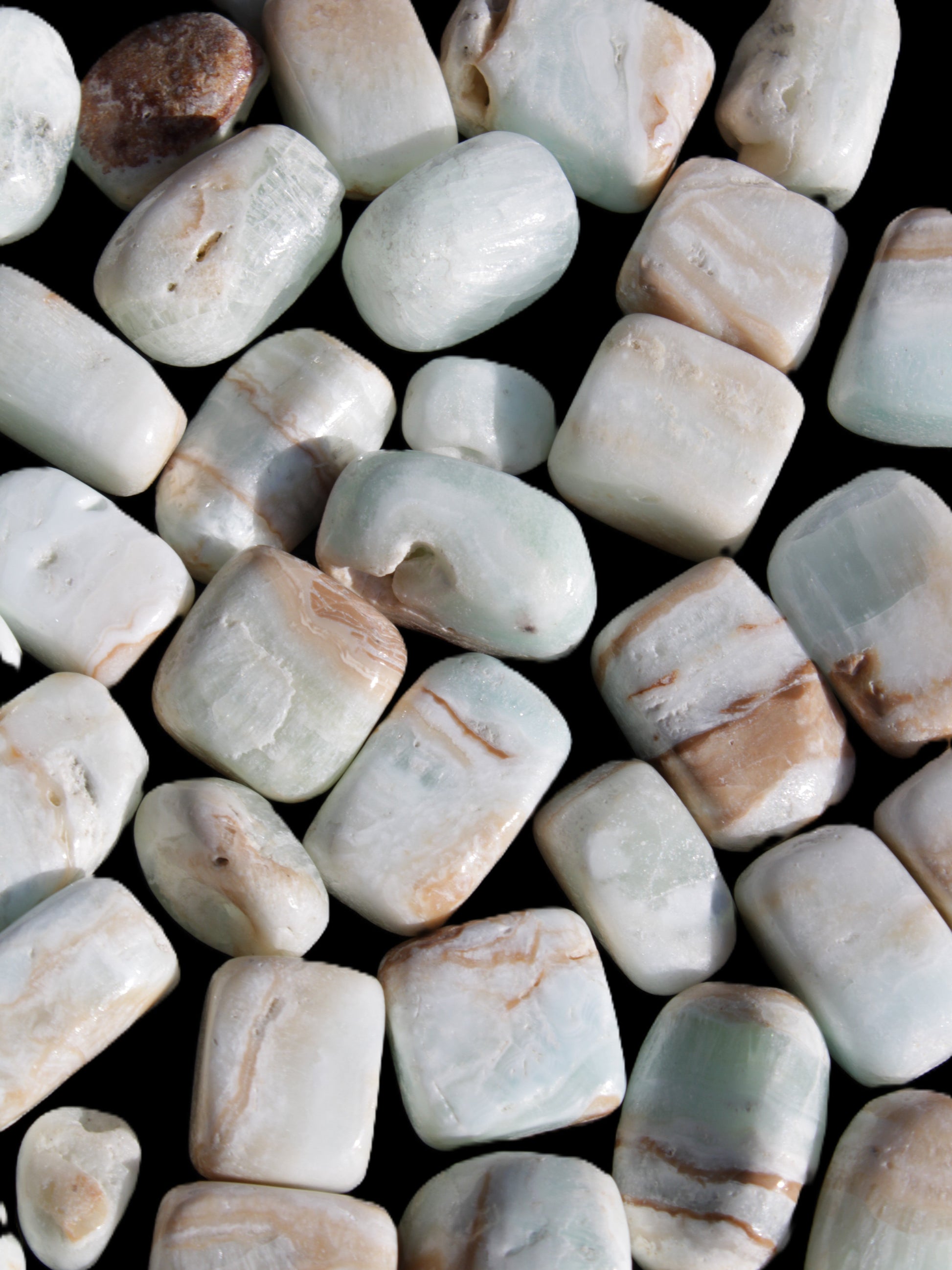 Caribbean Calcite 41 tumbled stones 20*10mm - 27*20mm  590g Wholesale Rocks and Things Store