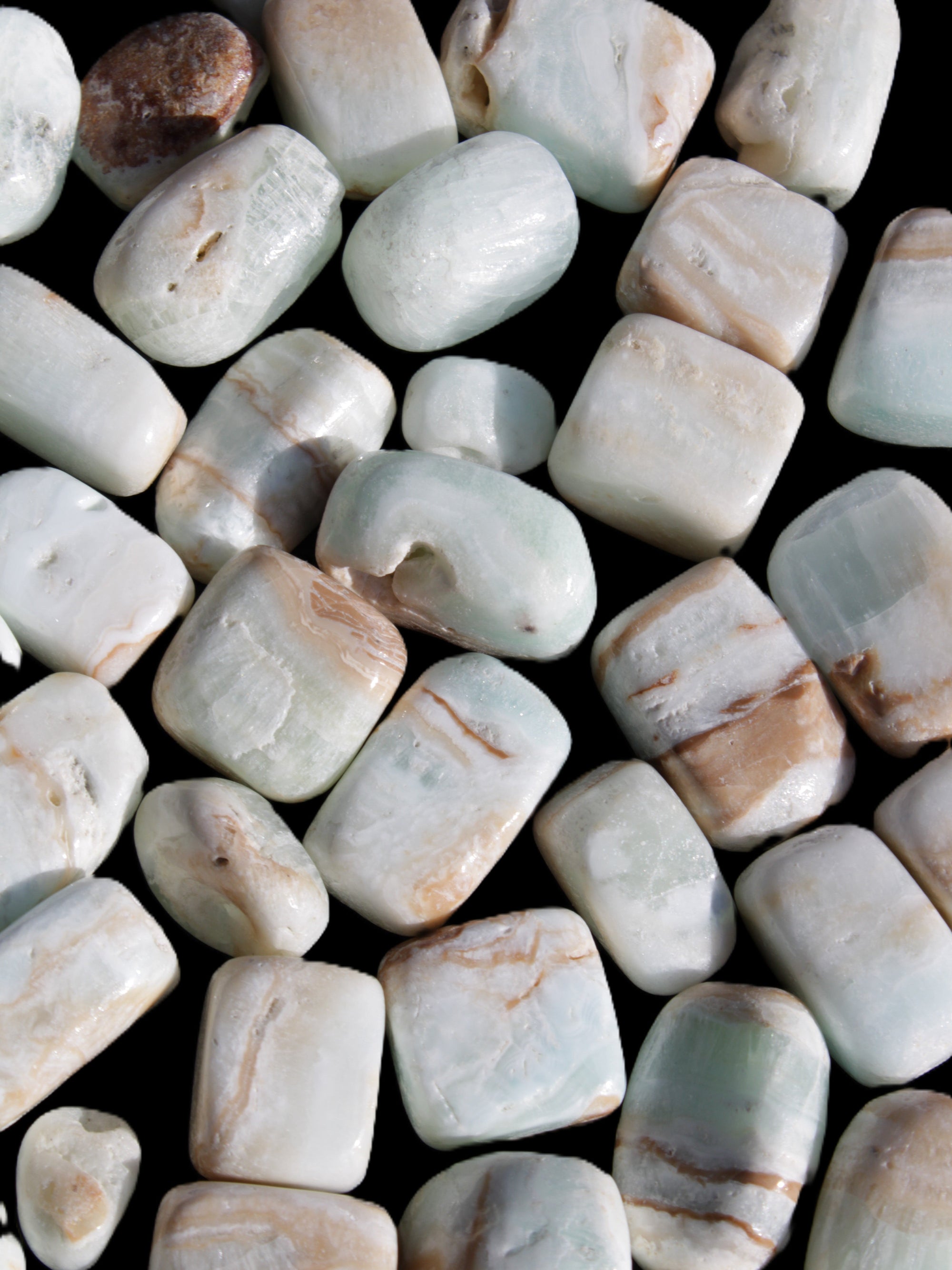 Caribbean Calcite 41 tumbled stones 20*10mm - 27*20mm  590g Wholesale Rocks and Things Store