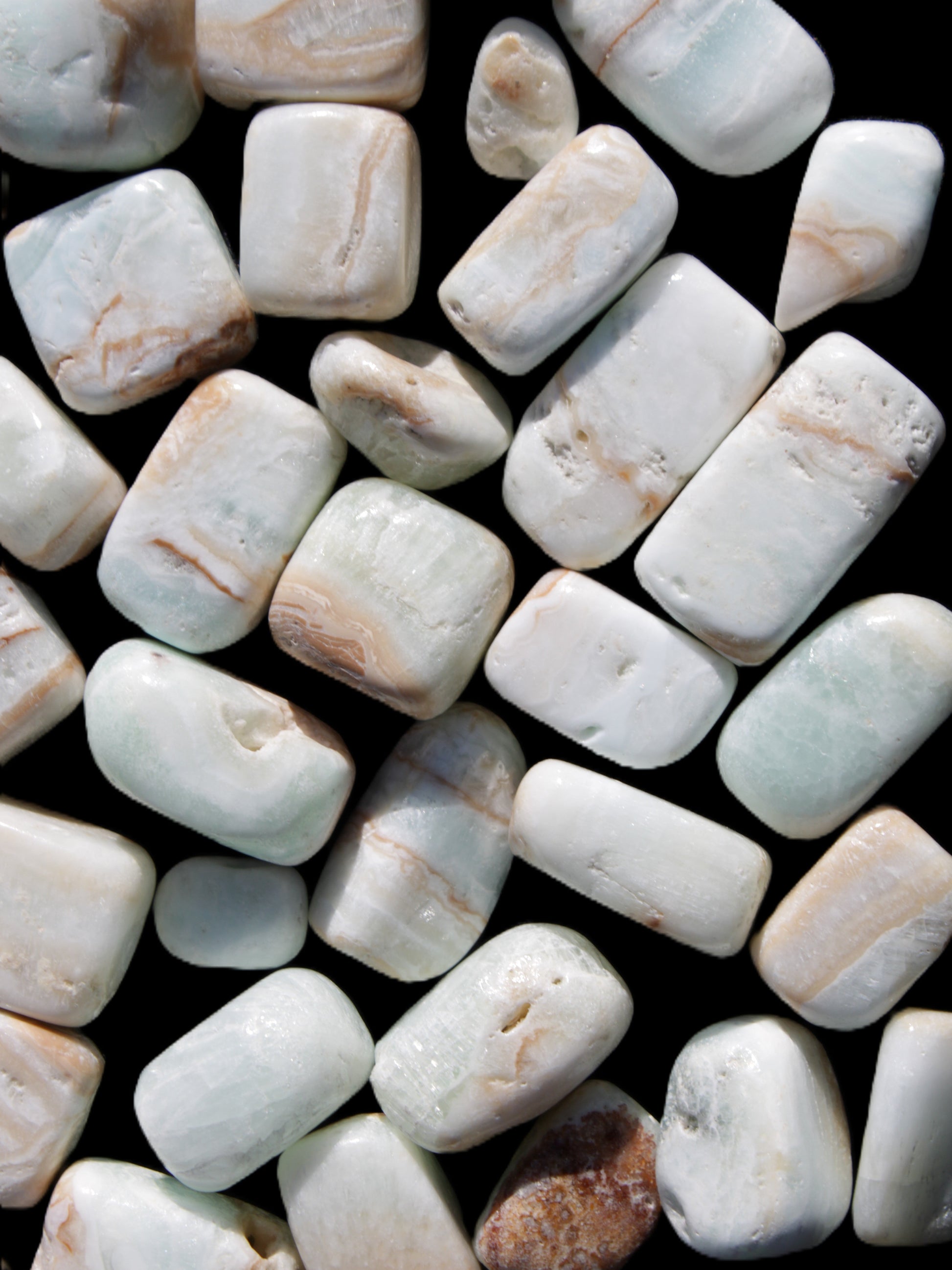 Caribbean Calcite 41 tumbled stones 20*10mm - 27*20mm  590g Wholesale Rocks and Things Store
