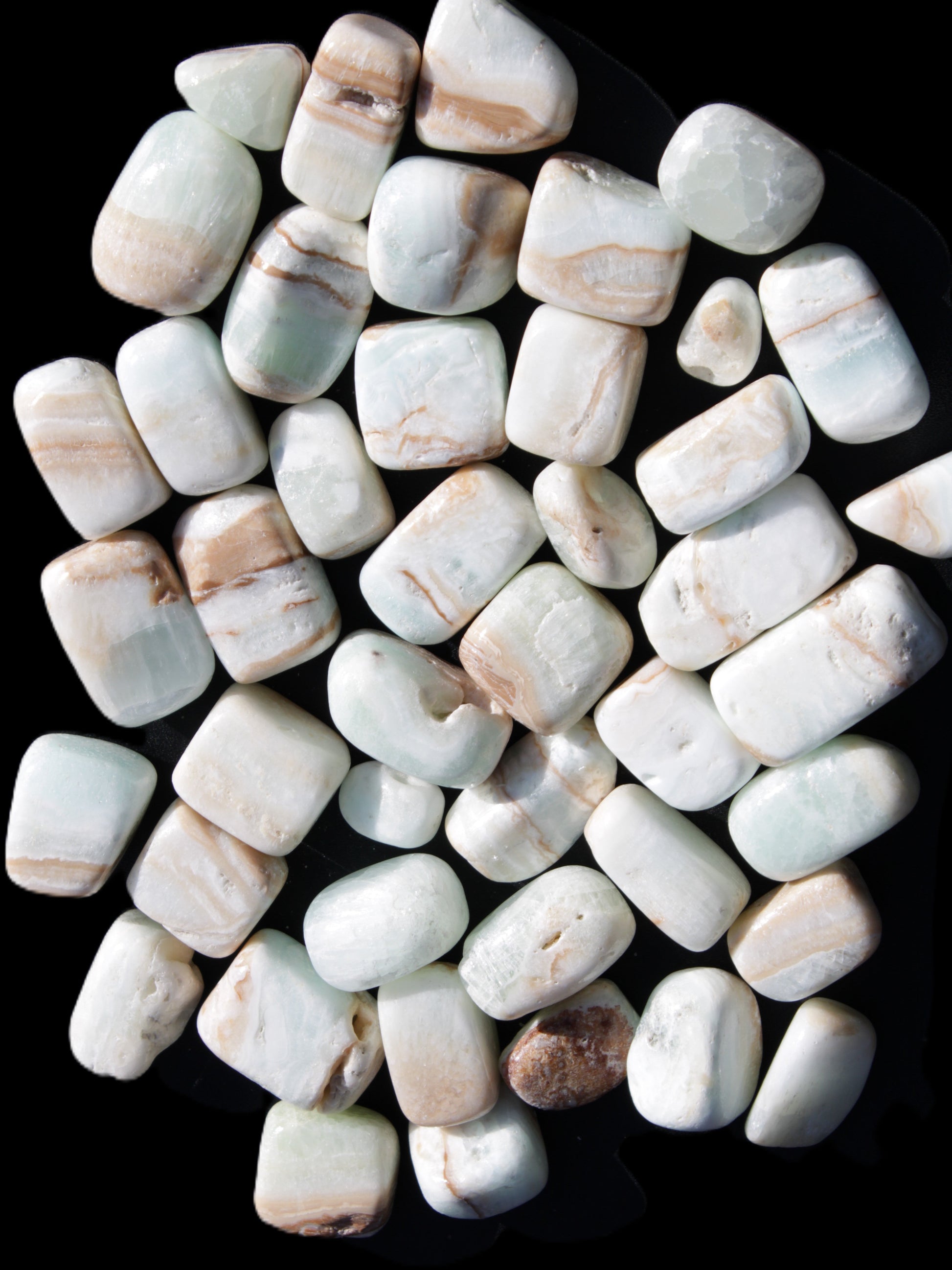 Caribbean Calcite 41 tumbled stones 20*10mm - 27*20mm  590g Wholesale Rocks and Things Store