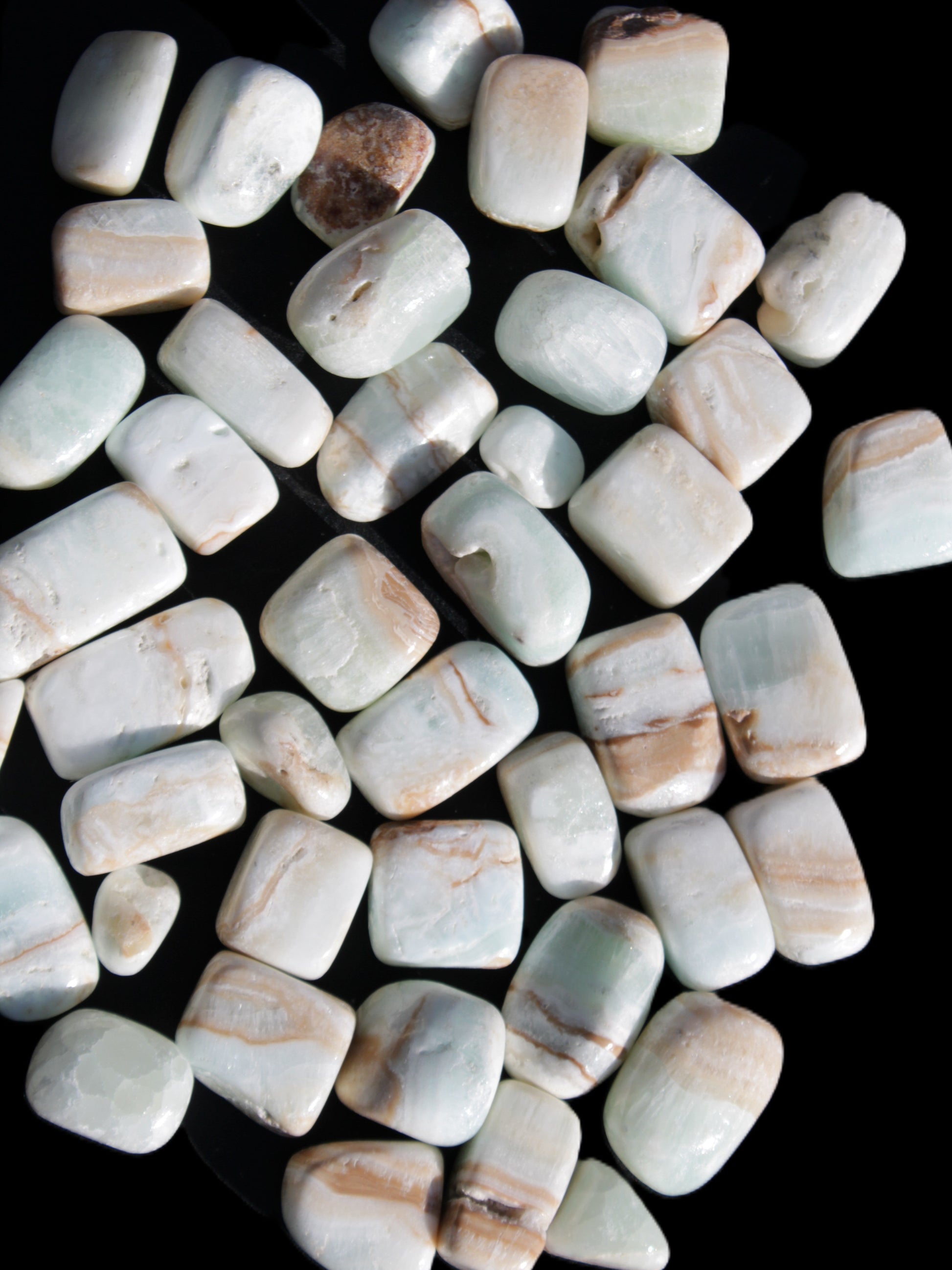 Caribbean Calcite 41 tumbled stones 20*10mm - 27*20mm  590g Wholesale Rocks and Things Store