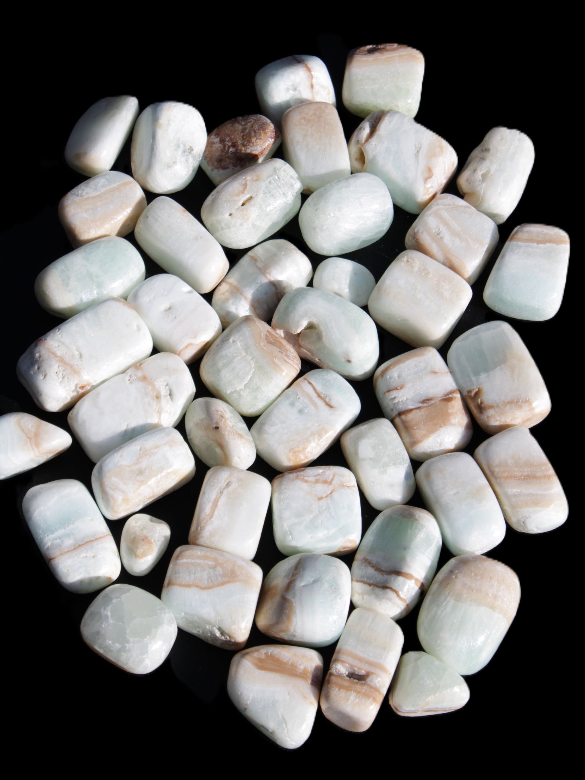 Caribbean Calcite 41 tumbled stones 20*10mm - 27*20mm  590g Wholesale Rocks and Things Store