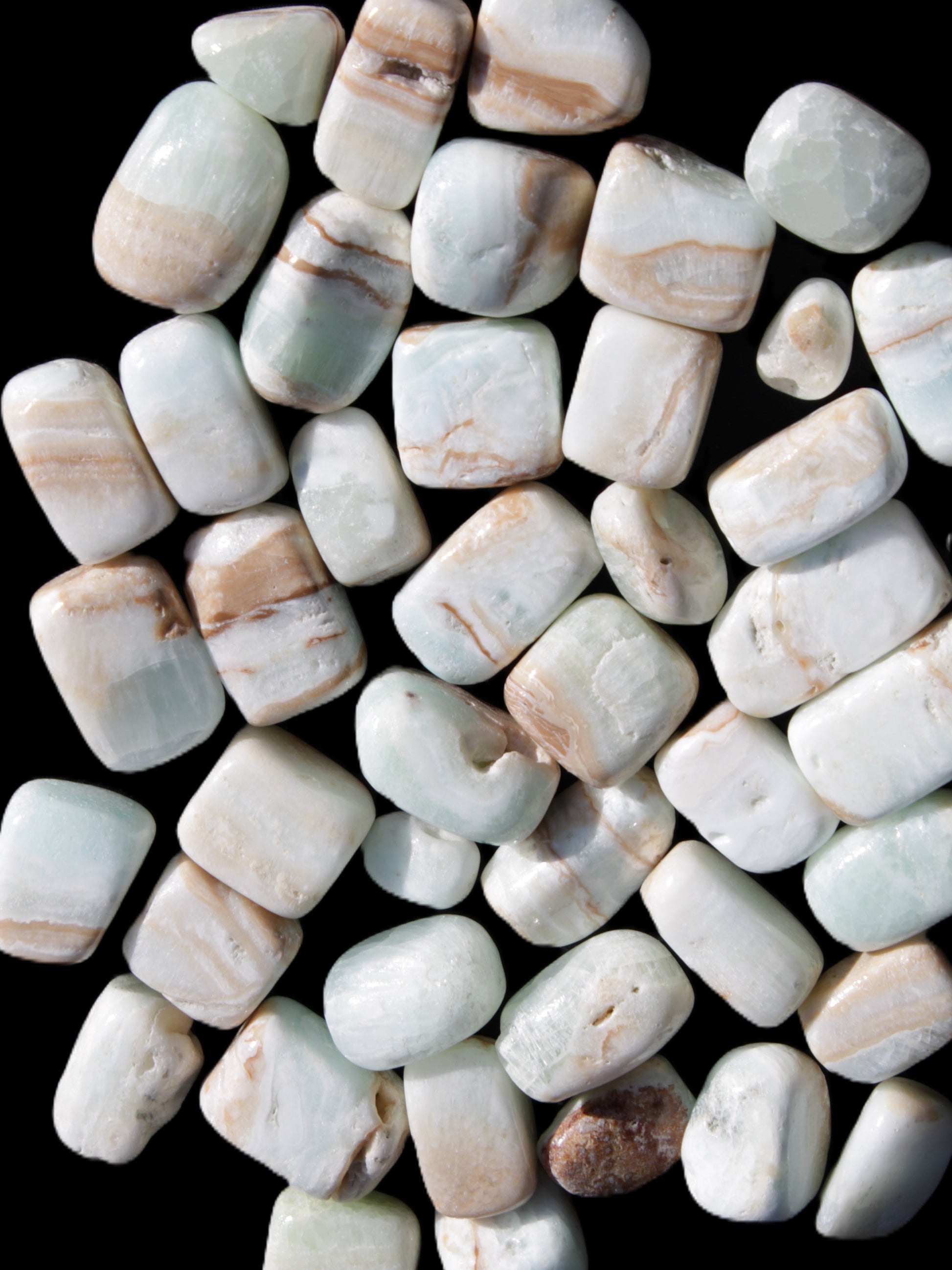 Caribbean Calcite 41 tumbled stones 20*10mm - 27*20mm  590g Wholesale Rocks and Things Store