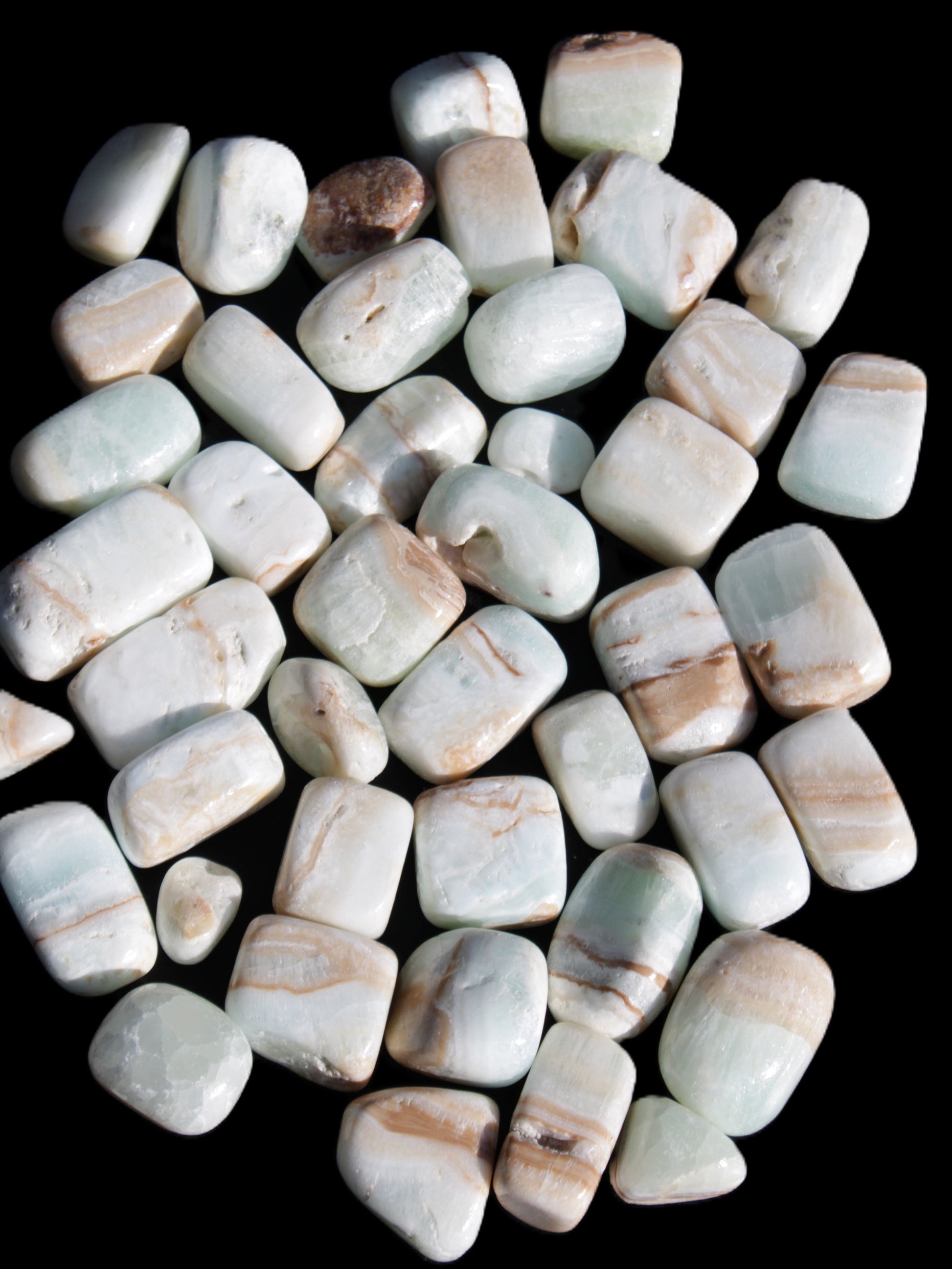 Caribbean Calcite 41 tumbled stones 20*10mm - 27*20mm  590g Wholesale Rocks and Things Store