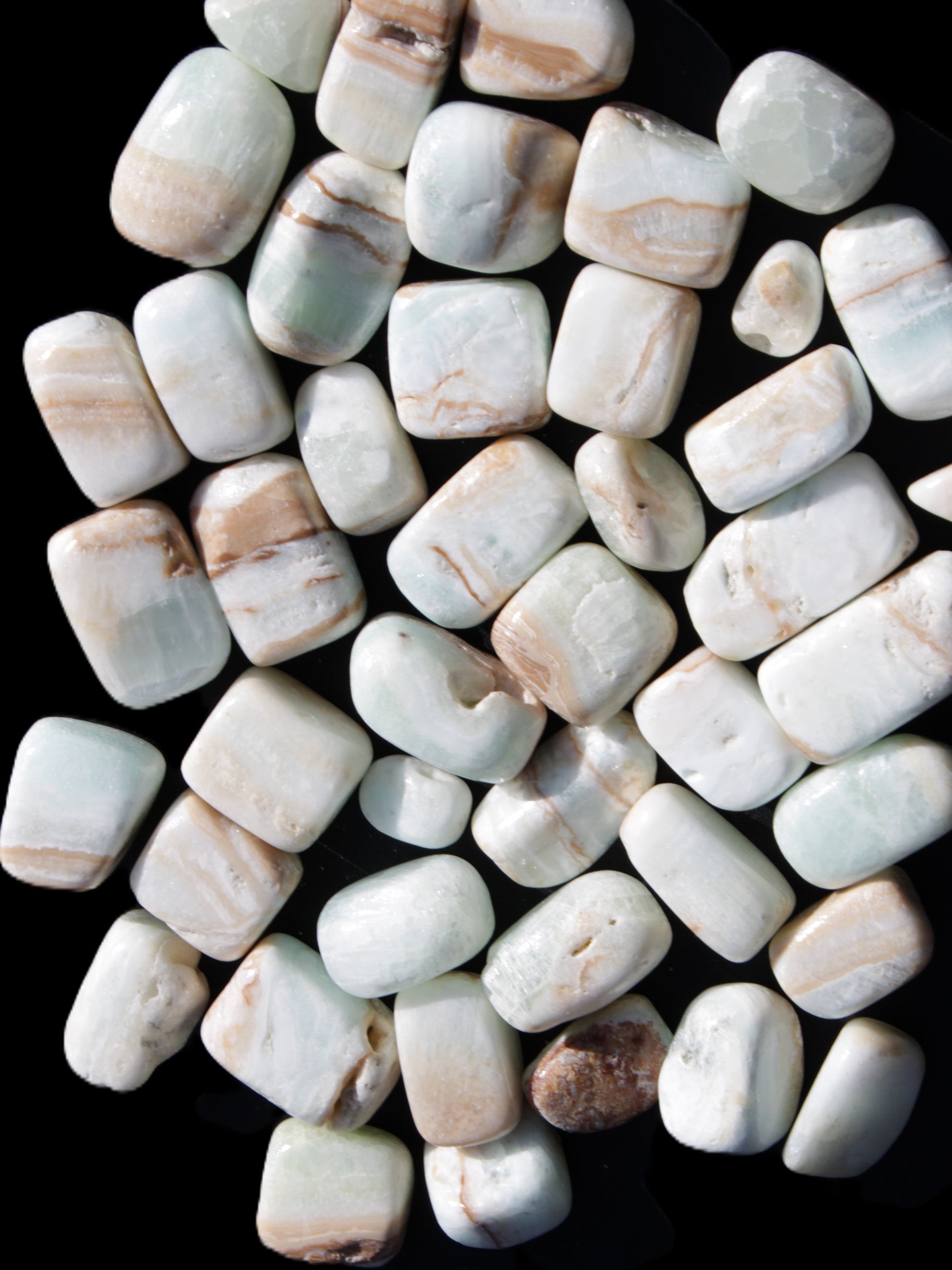 Caribbean Calcite 41 tumbled stones 20*10mm - 27*20mm  590g Wholesale Rocks and Things Store