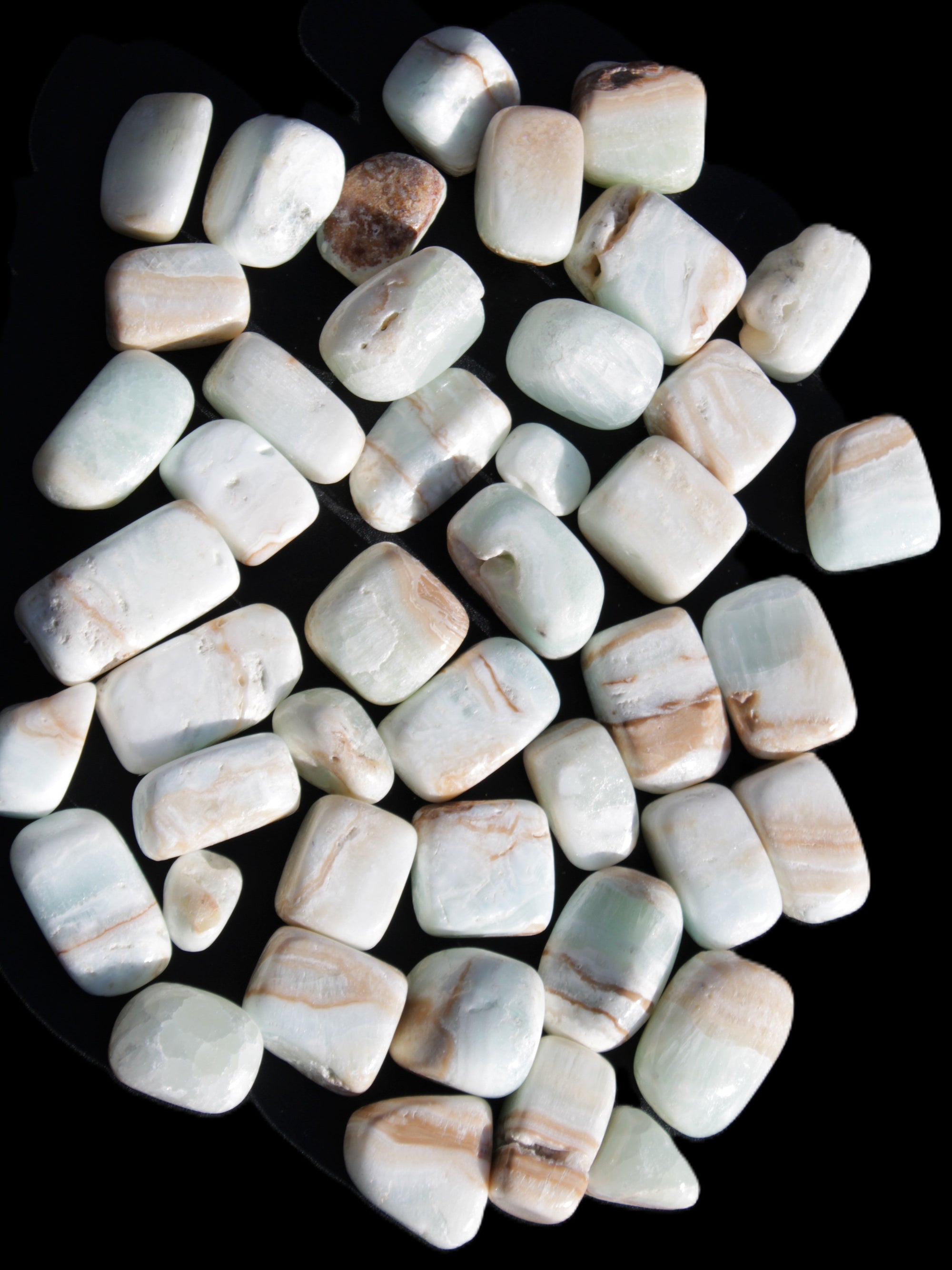 Caribbean Calcite 41 tumbled stones 20*10mm - 27*20mm  590g Wholesale Rocks and Things Store