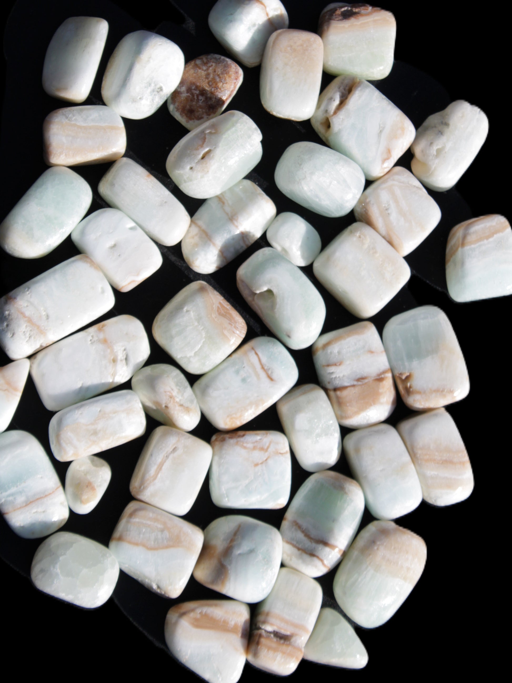 Caribbean Calcite 41 tumbled stones 20*10mm - 27*20mm  590g Wholesale Rocks and Things Store