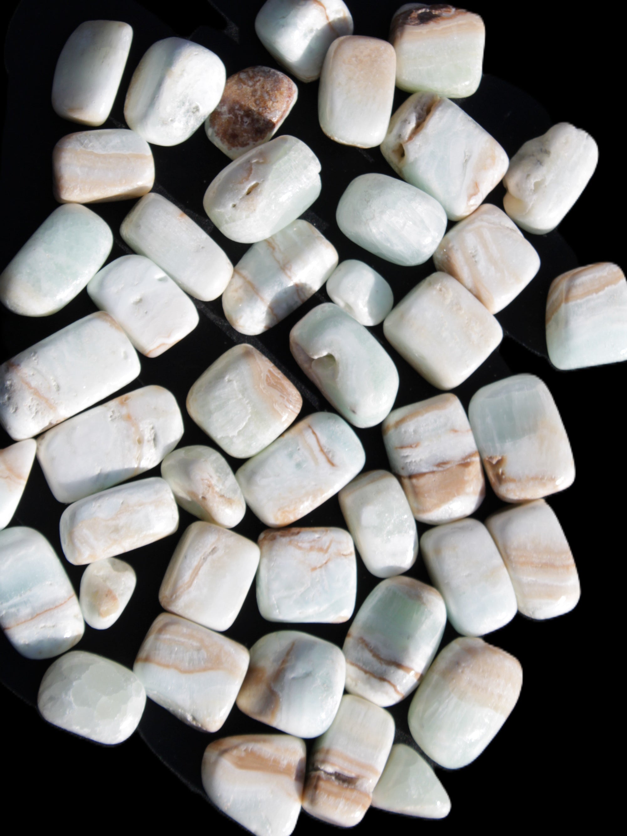Caribbean Calcite 41 tumbled stones 20*10mm - 27*20mm  590g Wholesale Rocks and Things Store