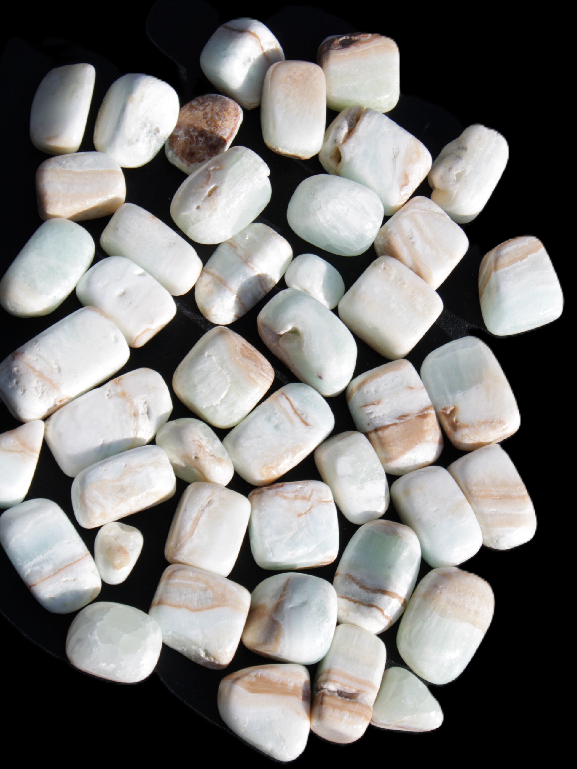 Caribbean Calcite 41 tumbled stones 20*10mm - 27*20mm  590g Wholesale Rocks and Things Store