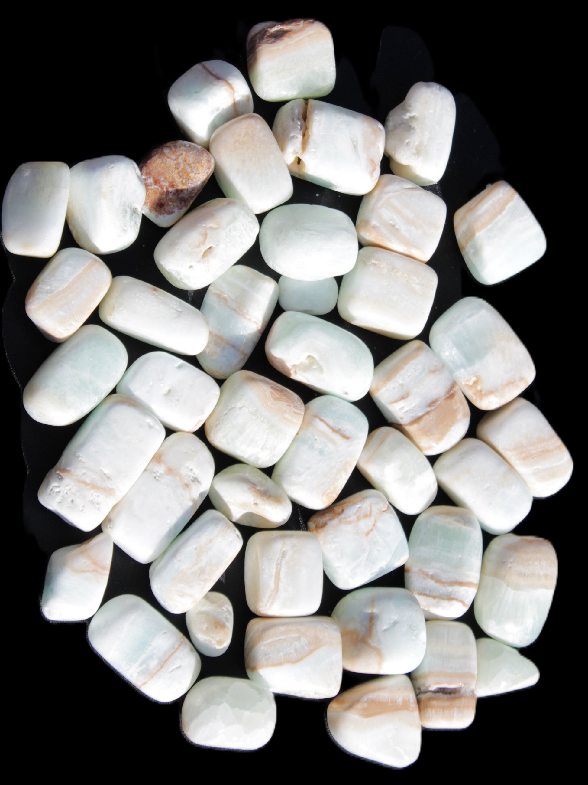 Caribbean Calcite 41 tumbled stones 20*10mm - 27*20mm  590g Wholesale Rocks and Things Store