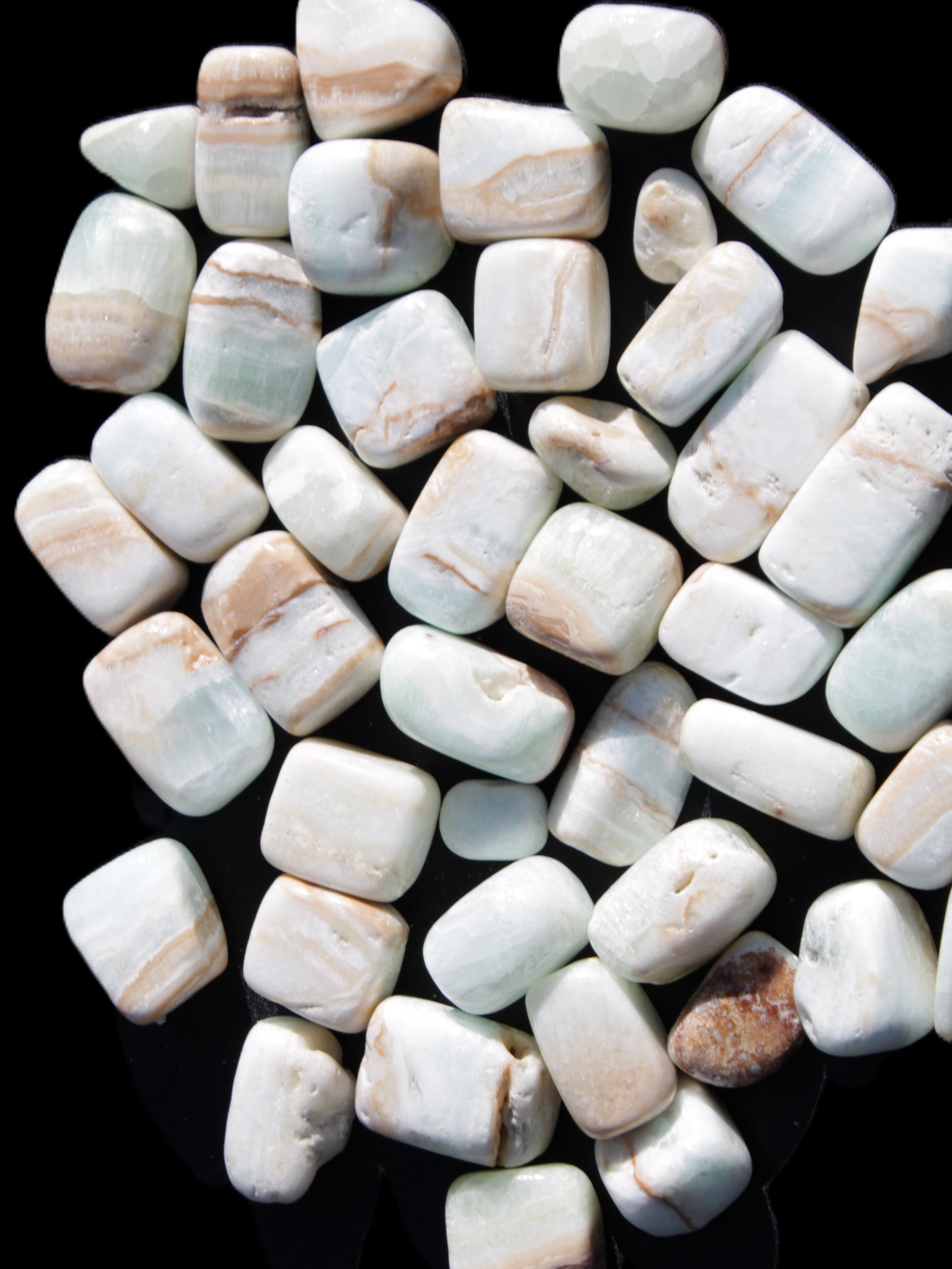 Caribbean Calcite 41 tumbled stones 20*10mm - 27*20mm  590g Wholesale Rocks and Things Store