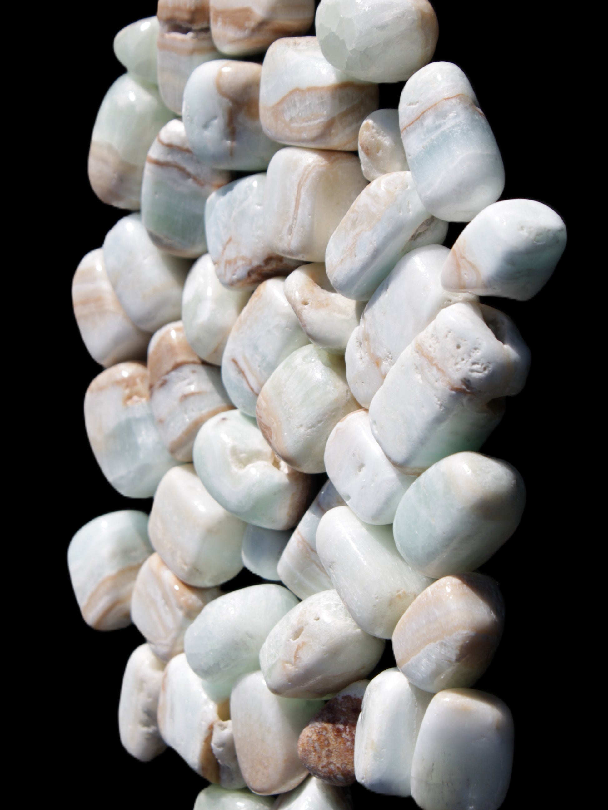 Caribbean Calcite 41 tumbled stones 20*10mm - 27*20mm  590g Wholesale Rocks and Things Store