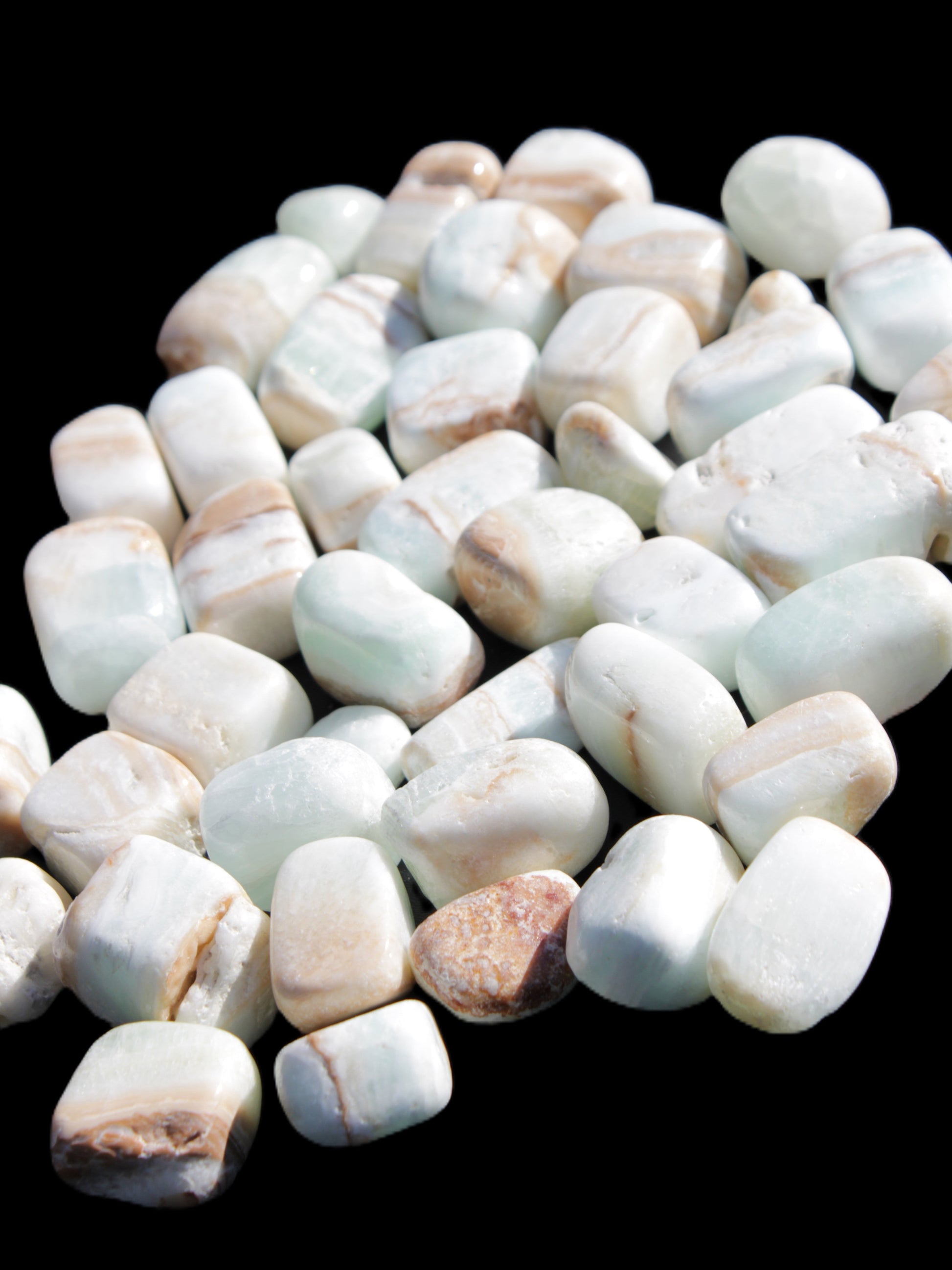 Caribbean Calcite 41 tumbled stones 20*10mm - 27*20mm  590g Wholesale Rocks and Things Store