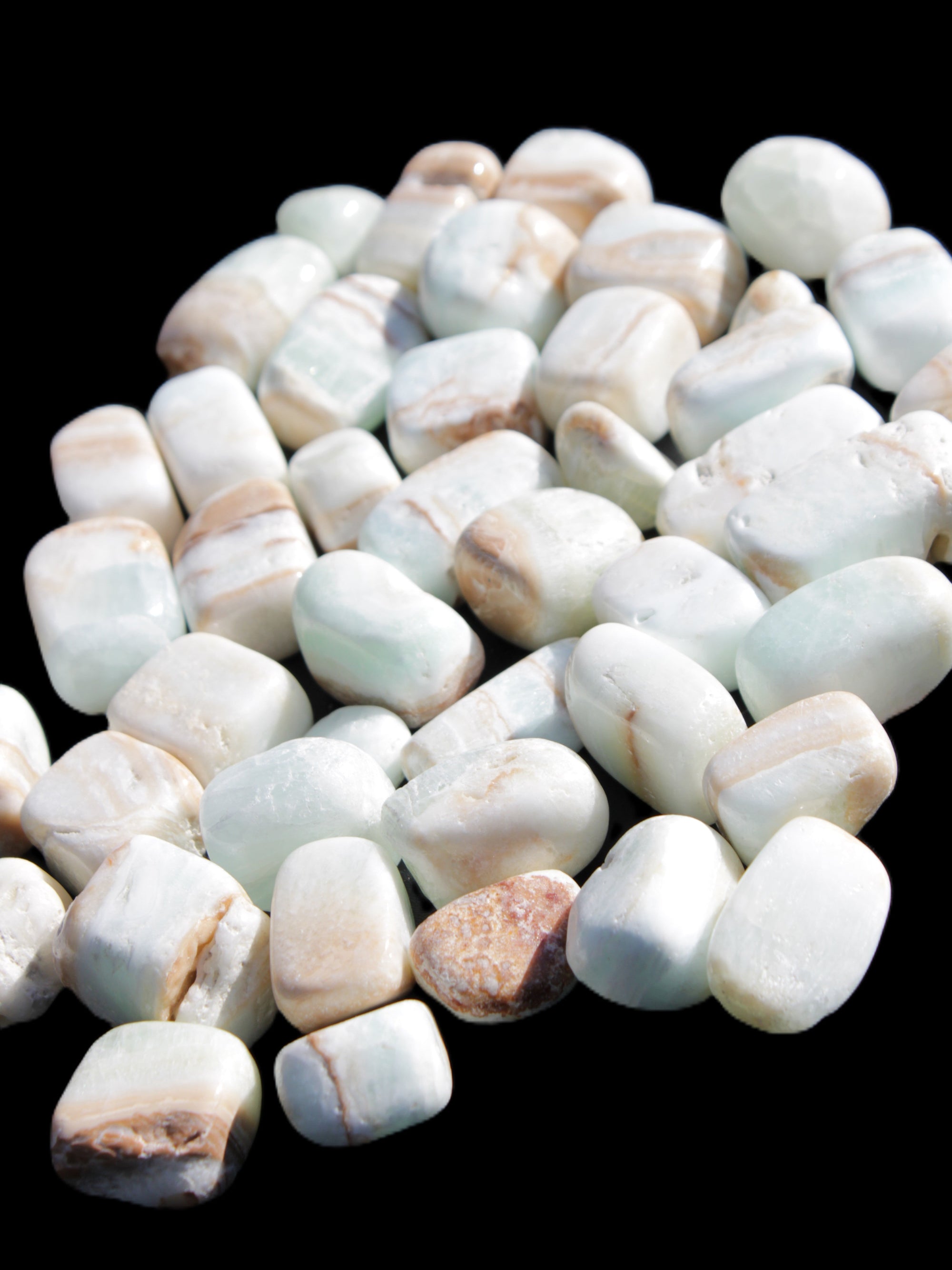 Caribbean Calcite 41 tumbled stones 20*10mm - 27*20mm  590g Wholesale Rocks and Things Store