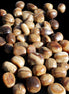 Chocolate Calcite 55 tumbled stones 21*11mm - 24-23mm  810g Wholesale in sunlight - Rocks and Things Store