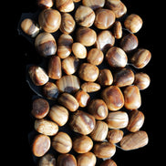 Chocolate Calcite 55 tumbled stones 21*11mm - 24-23mm  810g Wholesale in sunlight - Rocks and Things Store