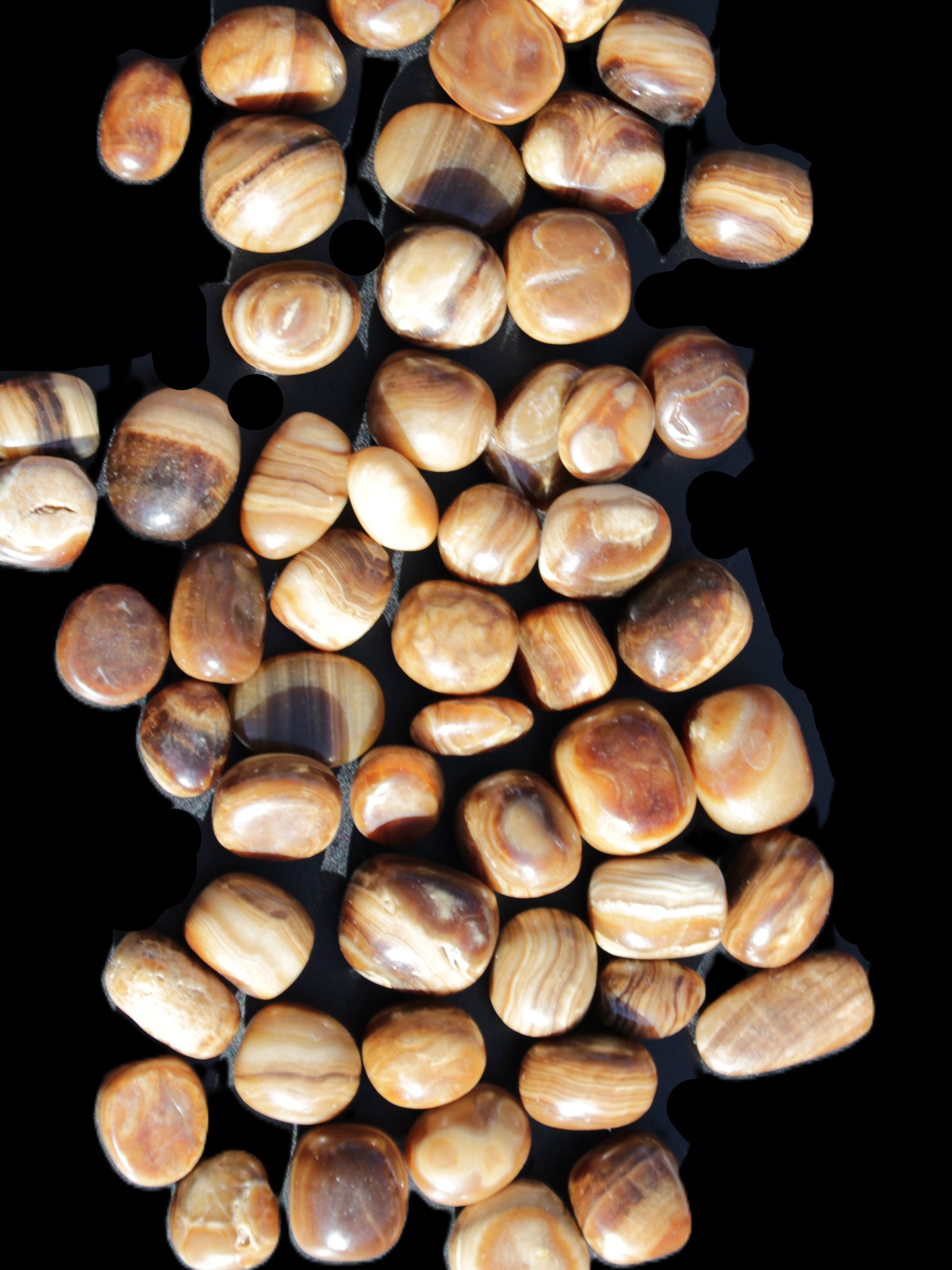 Chocolate Calcite 55 tumbled stones 21*11mm - 24-23mm  810g Wholesale in sunlight - Rocks and Things Store