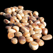 Chocolate Calcite 55 tumbled stones 21*11mm - 24-23mm  810g Wholesale in sunlight - Rocks and Things Store