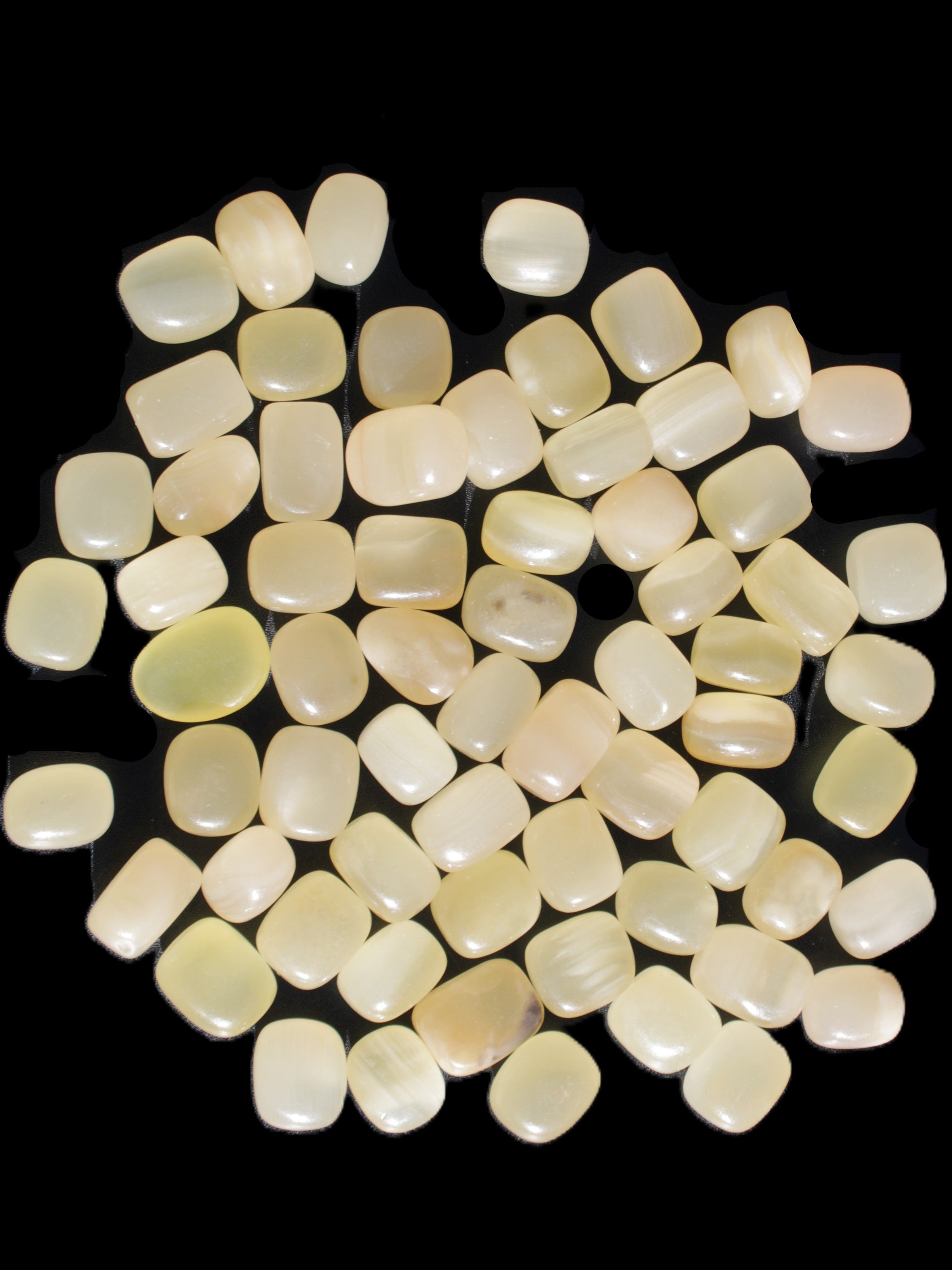 Lemon Calcite 66 tumbled stones 12*9mm - 21*18mm 600g Wholesale in sunlight - Rocks and Things Store